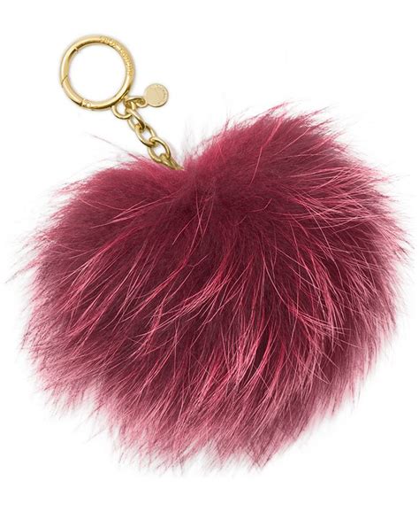 anhänger michael kors pom pom felloptik|Michael Kors.